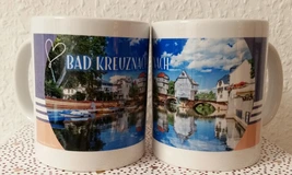 Zwei Tassen, bedruckt mit einer Fotografie der Kreuznacher Brückenhäuser