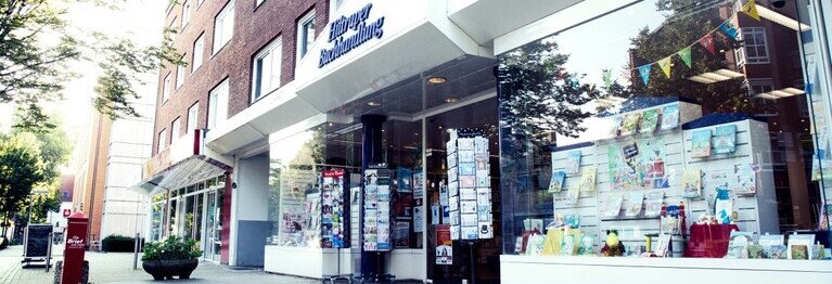 Frontansicht der Hiltruper Buchhandlung bei Tage